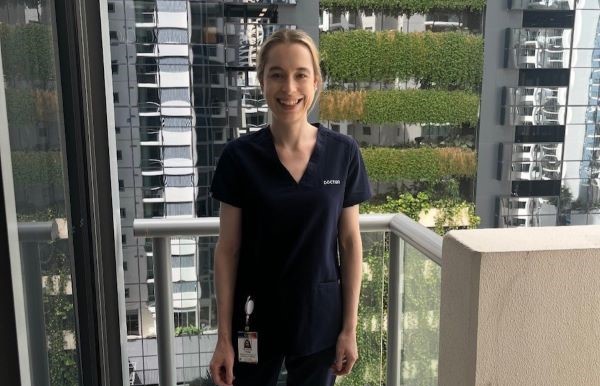 Doctor standing on hospital balcony